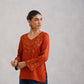 Nuresa Orange Floral Embroidered Top
