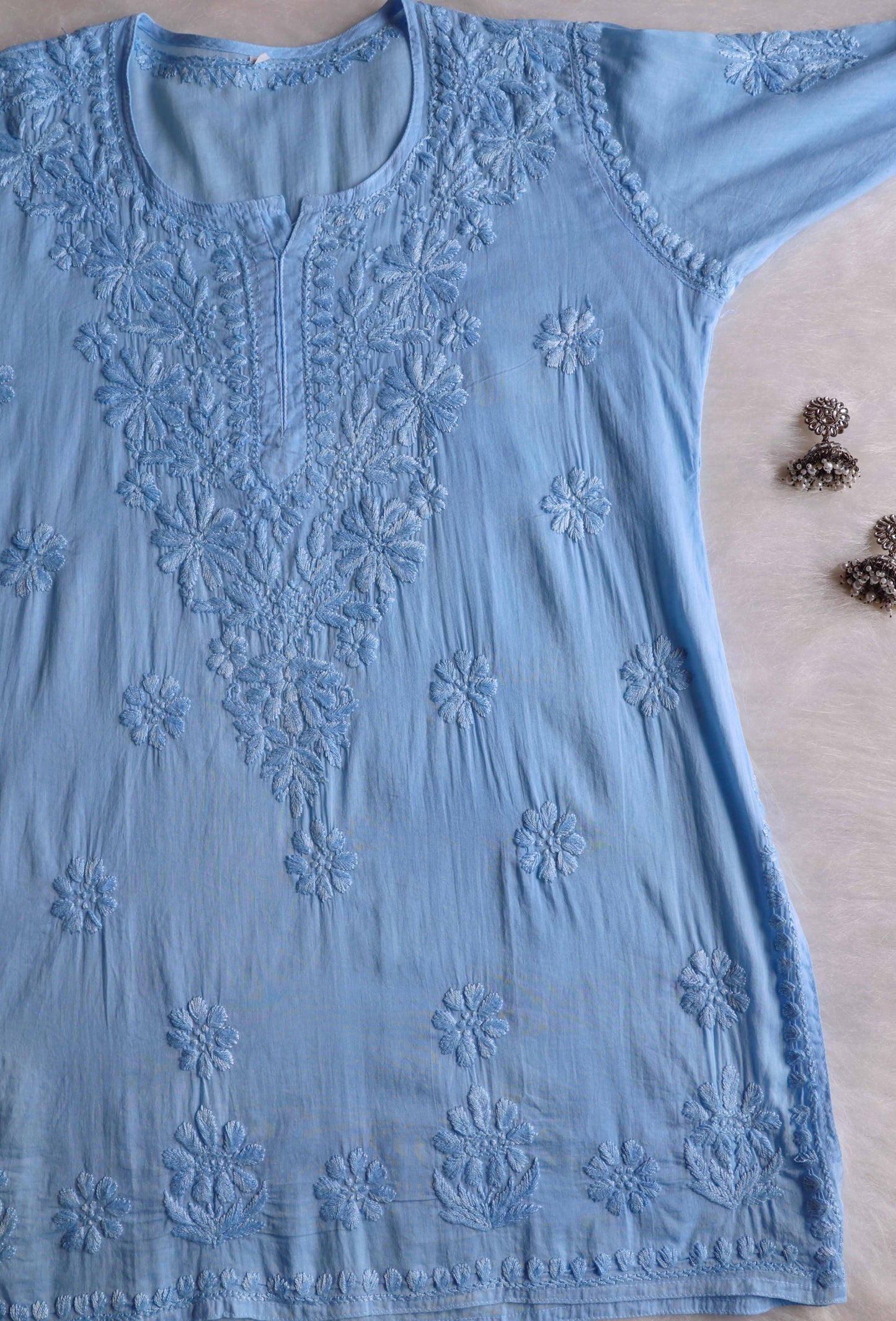 Nazakat ice blue short kurta – neckline and stitching close-up